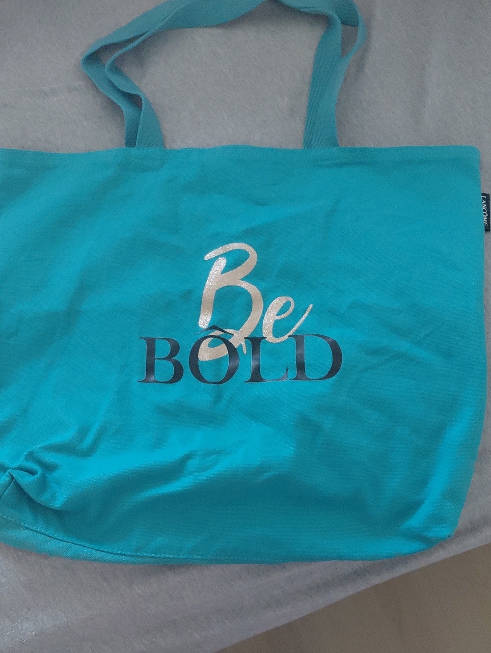 Lancome Teal Canvas Tote with Silver "Be BOLD" Lettering